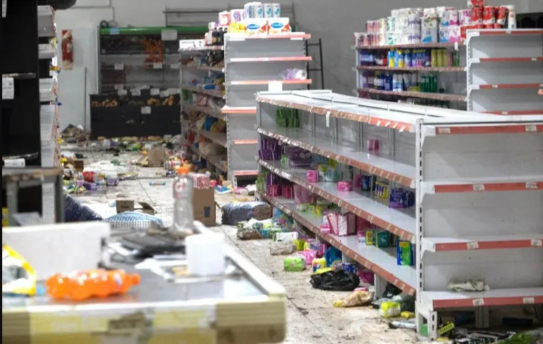 comercio afectado por los saqueos