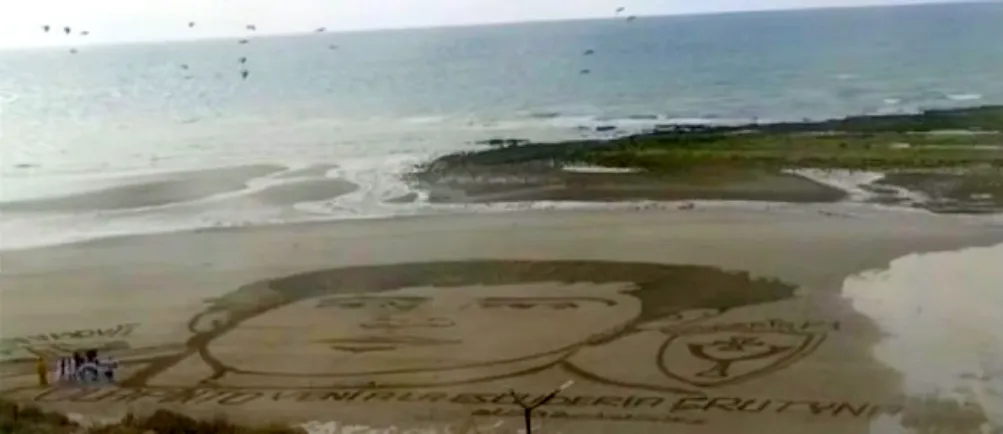 imagen gigante de Colapinto en la arena