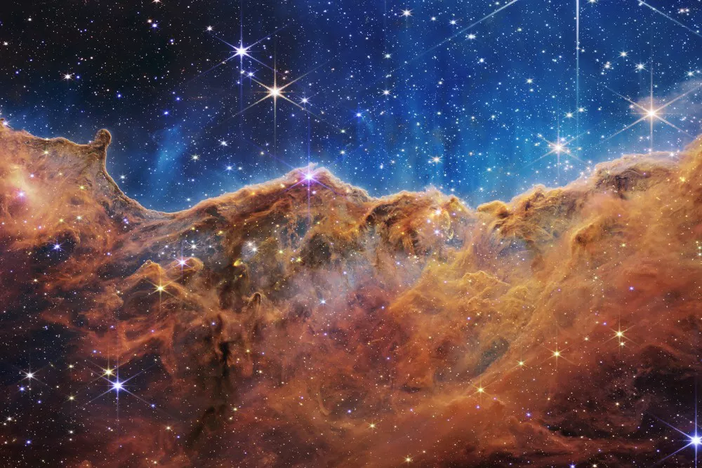 “Cosmic Cliffs” in the Carina Nebula - Webb