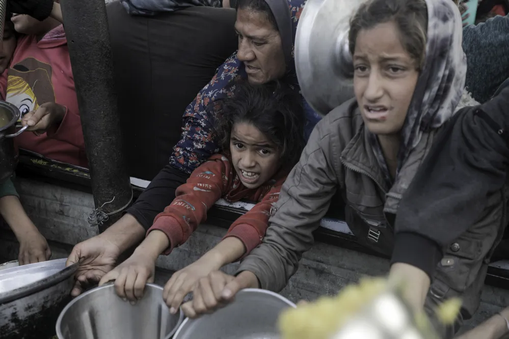 EL OBJETIVO FOTO GAZA AYUDA HUMANITARIA NA